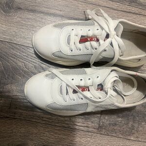 Prada White Lace-Up Sneakers with Red Accent